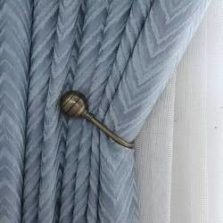 A parede de cortina decorativa da cor dourada engancha o estilo luxuoso simples com corda